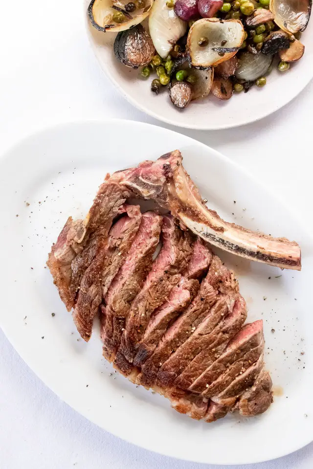 Read more about the article Garlic Steakhouse Butter on a Grilled Rubbed Ribeye Steak.